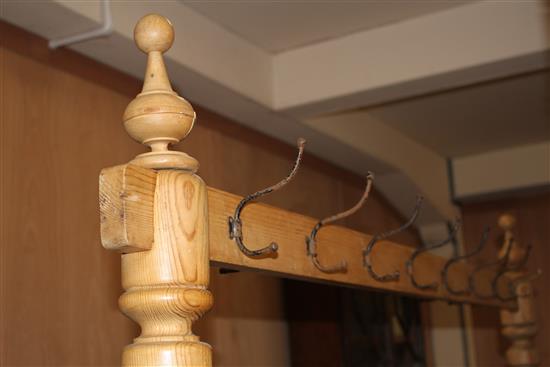 A large turned pine coat rack, W.180cm H.190cm